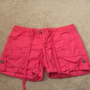 Pink shorts.